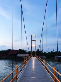 Bridge over river against sky