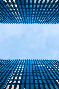 Low angle view of modern building against sky