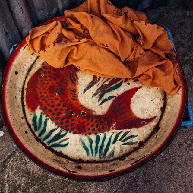 high angle view, close-up, still life, creativity, directly above, indoors, art, art and craft, no people, circle, pattern, brown, table, shape, single object, day, dry, heart shape, overhead view, red