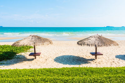 Scenic view of beach against sky