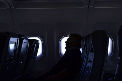 Man sitting in plane