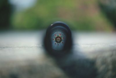 Close-up of toy against glass window