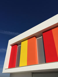 Low angle view of built structure against blue sky