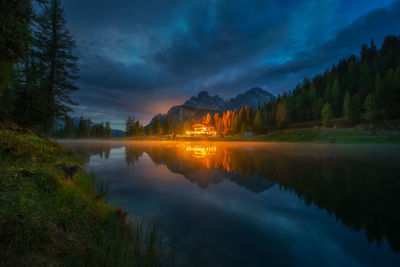 Scenic view of lake at sunset