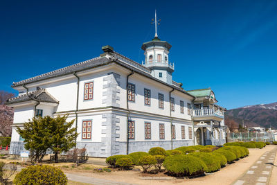 Buildings against blue sky