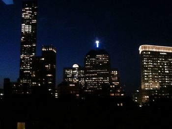 Illuminated cityscape at night