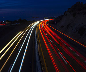 Car lights paint the scenic road looking at san diego california from tijuana