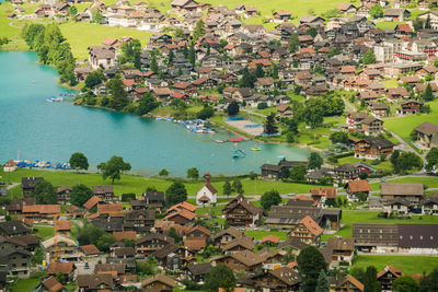 Lungern lake in obwalden in summer with a village from above