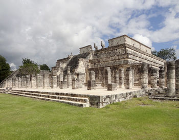 View of historical building against cloudy sky