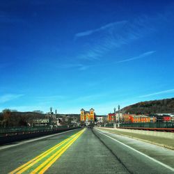 Road against blue sky