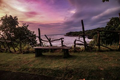 Scenic view of field against sky during sunset