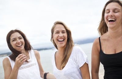 Happy women on beach