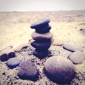 Close-up of stones on pebbles at beach