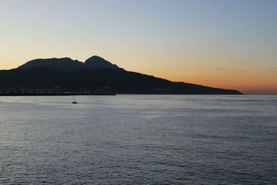 Scenic view of beach at sunset