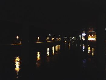 Reflection of illuminated buildings in water