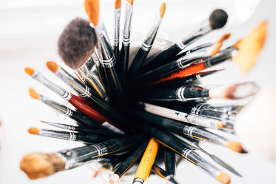 High angle view of assorted brushes