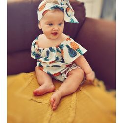 Cute baby boy sitting at home
