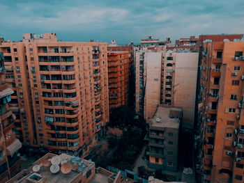 High angle view of buildings against sky