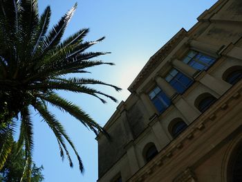 Low angle view of building against clear blue sky