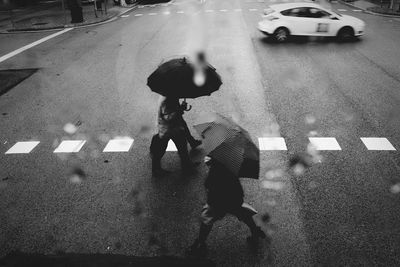 Woman standing on city street