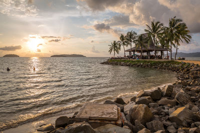 Scenic view of sea against sky at sunset