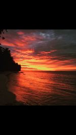 Scenic view of sea at sunset