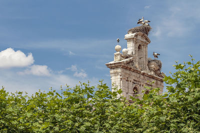 Low angle view of statue against sky