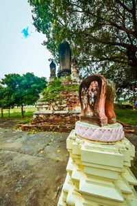Statue against temple