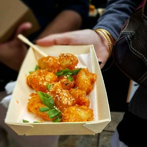 Close-up of hand holding food