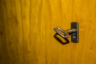 Close-up of door handle on table