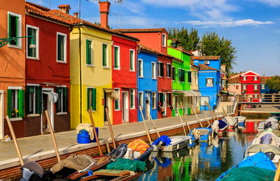 Boats moored at harbor