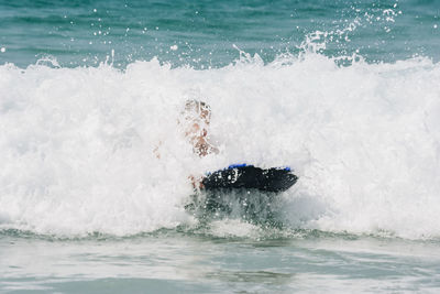 Waves splashing on swimming pool