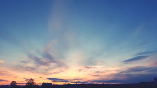 Low angle view of dramatic sky during sunset