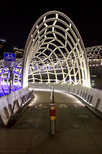 View of bridge in city at night