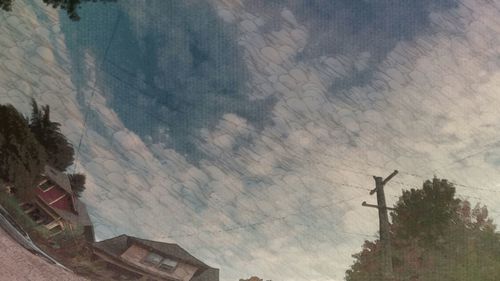 Built structure against cloudy sky