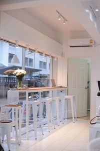 Empty chairs and table in restaurant