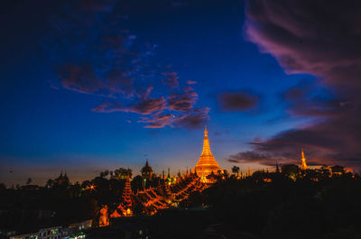 Panoramic view of illuminated buildings at night