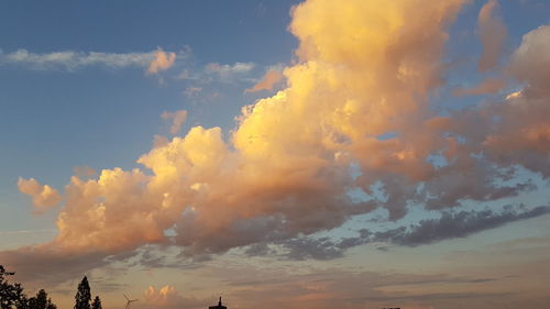 Low angle view of dramatic sky during sunset