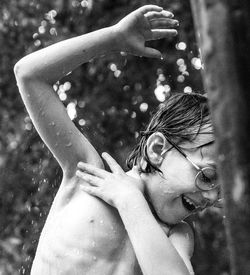 Kid enjoying rain