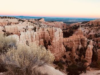 Scenic view of rock formations against sky