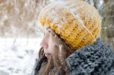 Young woman in knit hat during winter