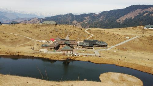 Scenic view of landscape with mountain range in background