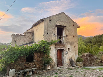 Low angle view of old building against sky