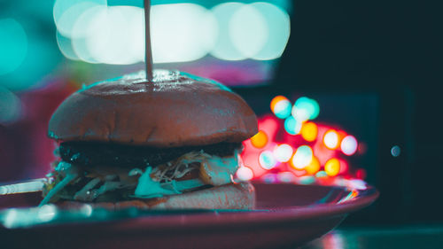 Close-up of illuminated cake