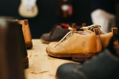 Close-up of shoes on table