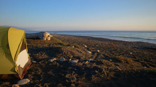 Scenic view of sea against clear sky