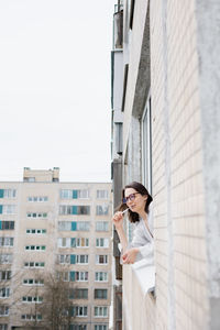 Young woman using mobile phone