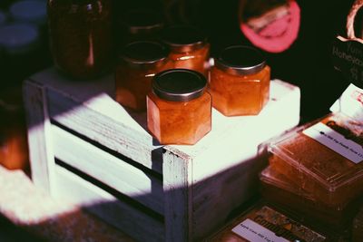 High angle view of honey in glass jars