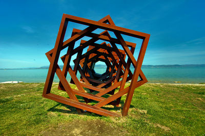 Scenic view of sea against blue sky