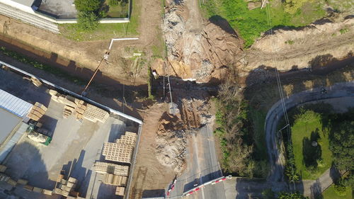 High angle view of road by buildings in city
